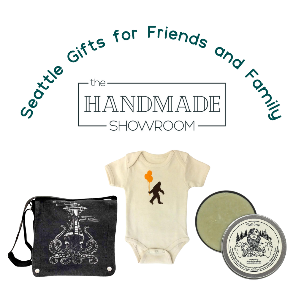 Seattle Gifts for friends and family featuring an image of a messenger bag, baby romper with Sasquatch, and some soap with an image of the Seattle Fremont troll 