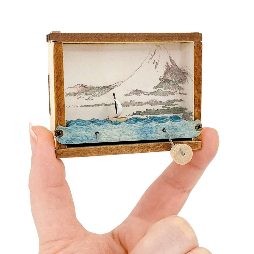 Kinetic Sculpture - Hand Cranked Wooden Mt. Fuji Black and White Sailboat by Cartoon Monster