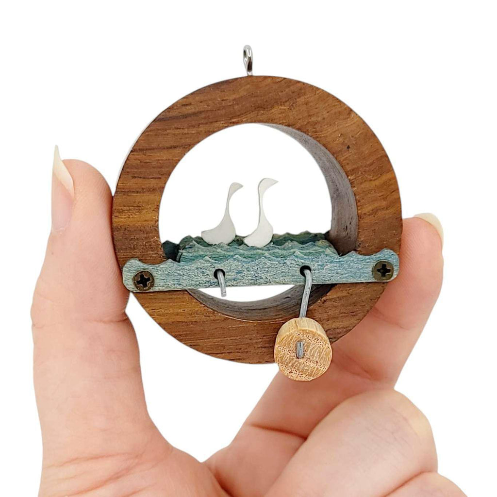 Kinetic Ornament - Hand Cranked Wooden Swans Circle by Cartoon Monster